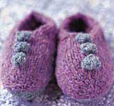 button embelished shoes